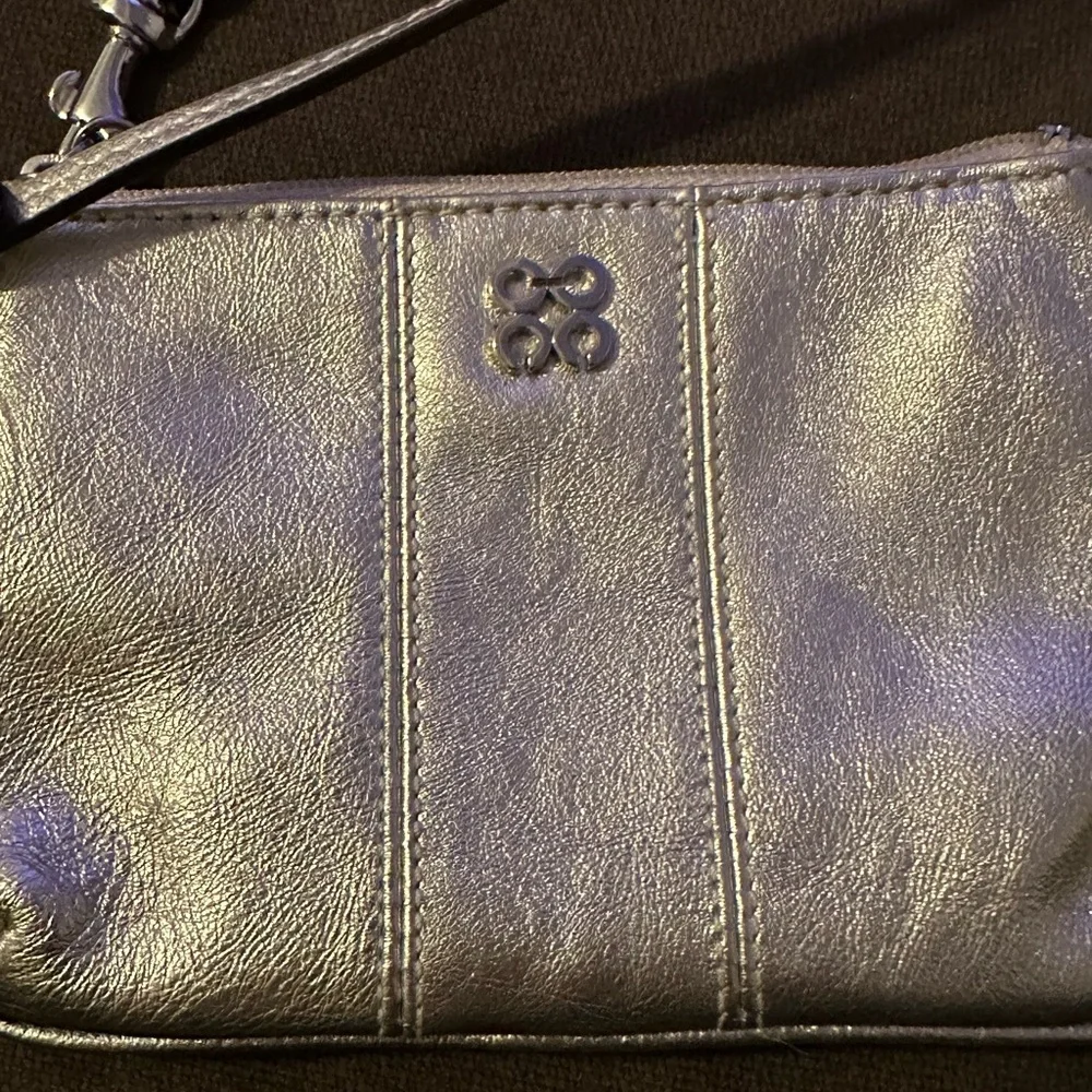 Coach wristlet NWT gold‎